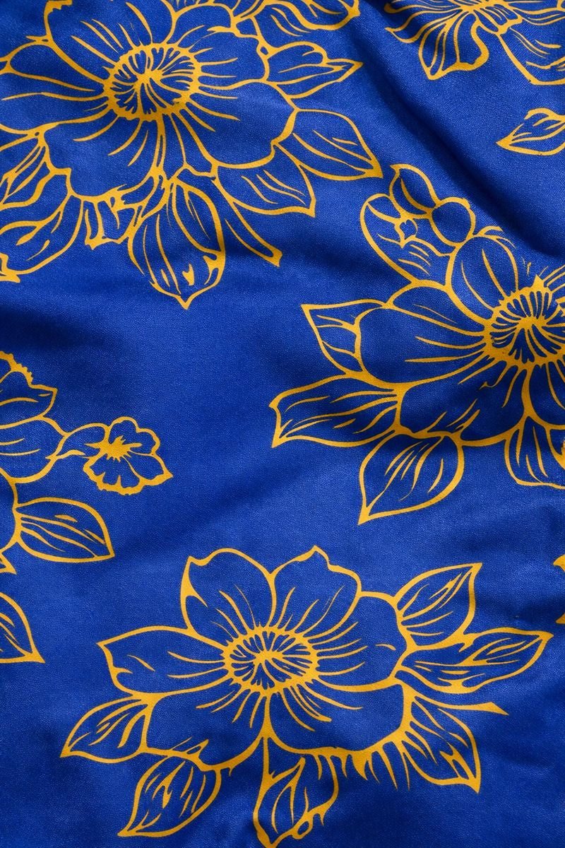 Blue fabric with yellow floral patterns