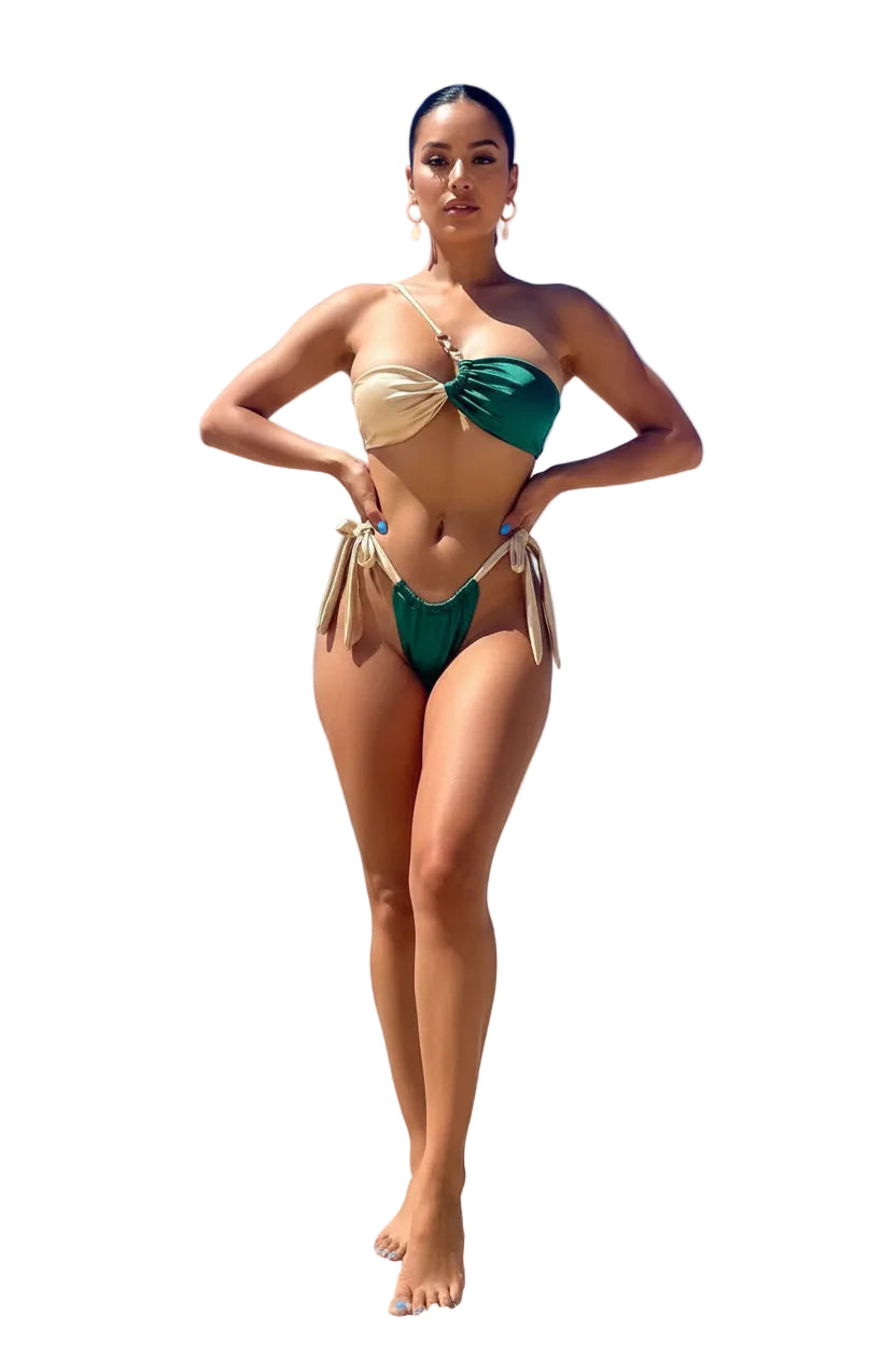 Person wearing a green and beige bikini set with a clear blue sky background