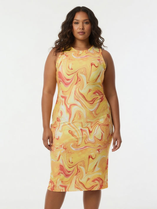 Woman wearing a yellow and pink marbled dress on a white background