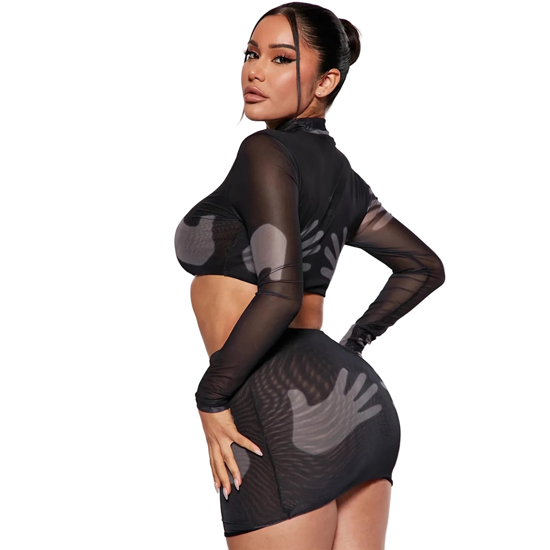Woman wearing a black sheer outfit with a white background