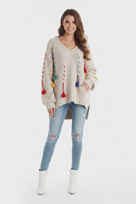 Elevate your cozy-chic style with the Bronxinit Oversized V-Neck Sweater. 